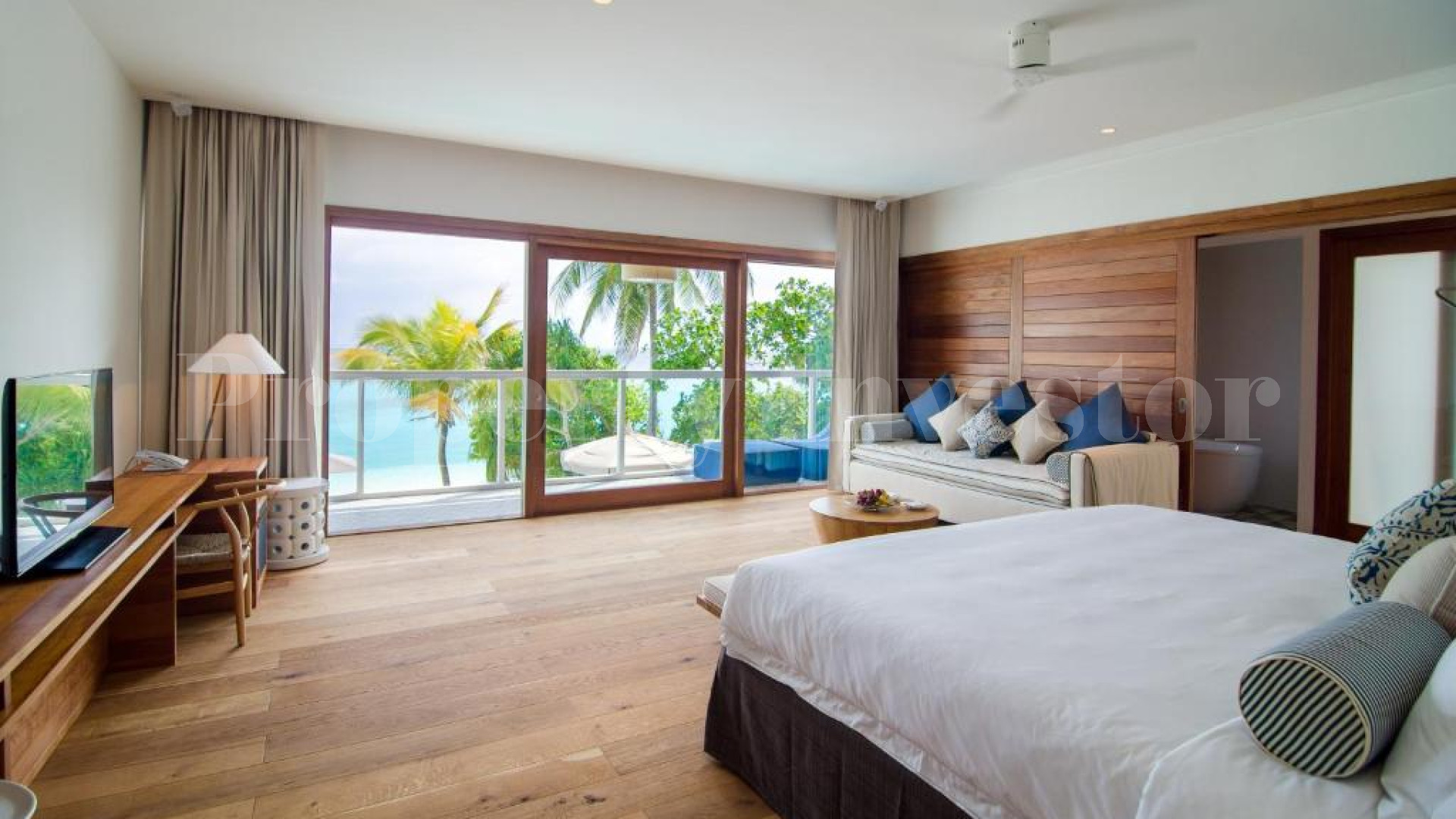 Эксклюзивная курортная частная резиденция с 4 спальнями на пляже на Мальдивах