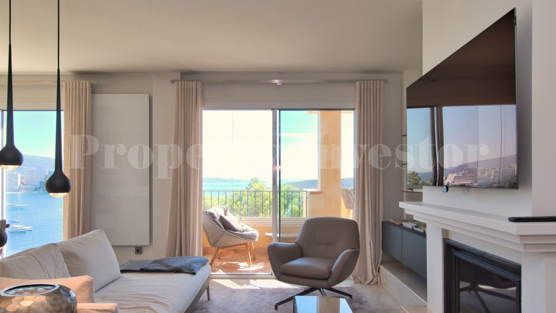 Роскошные апартаменты на первой линии с 2 спальнями и видом на море в Кала Винас