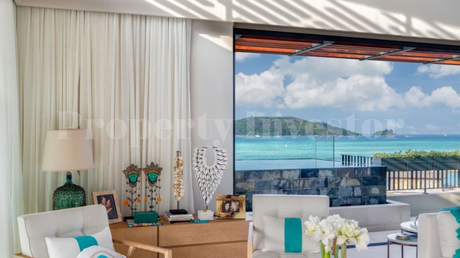 Эксклюзивный роскошный пентхаус на пляже с 4 спальнями с дизайнерским ремонтом на Сейшелах (Пентхаус С)
