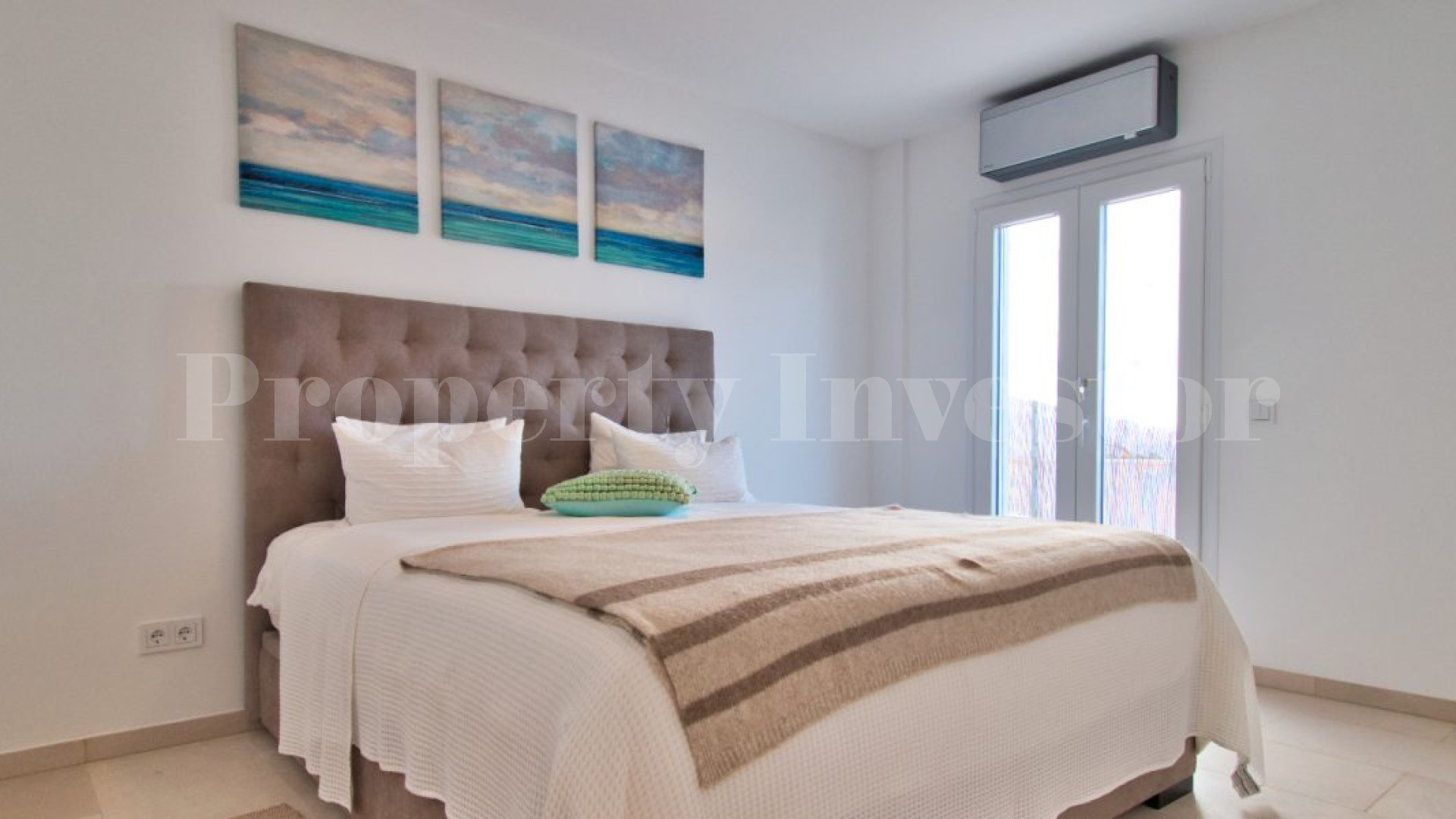 Эксклюзивные современные апартаменты с 3 спальнями с видом на море в Порт Андрач