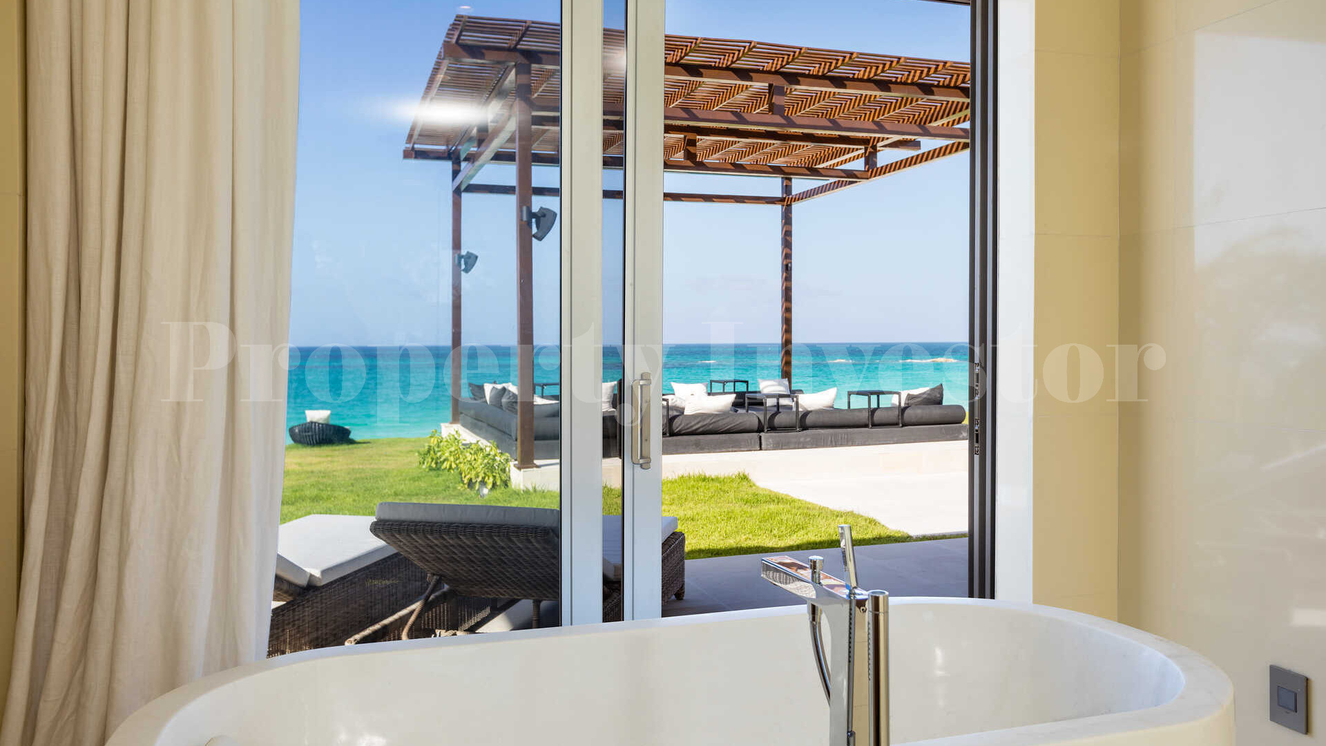 Райская роскошная вилла с 4 спальнями на пляже на о. Эльютера, Багамы