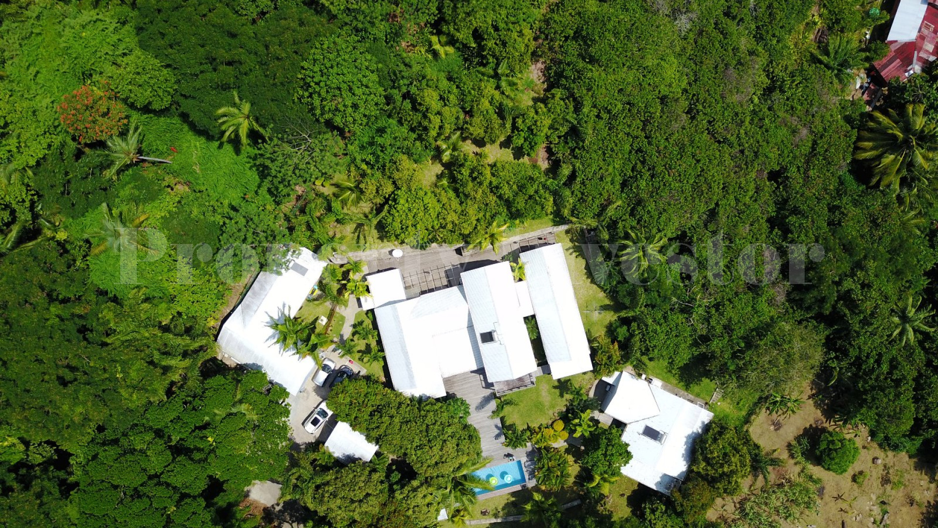 Экзотическая вилла с 6 спальнями с видом на море среди ухоженных пышных зеленых садов на о.Маэ, Сейшелы